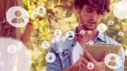 Poster - Animation of network of connections with people icons over caucasian man using tablet