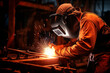 © EricMiguel - A skilled worker performs intense welding, with sparks flying, highlighting craftsmanship and industry safety.