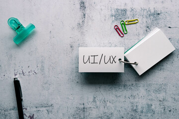 Poster - There is word card with the word UIUX. It is as an eye-catching image.
