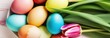 © Anzelika - Holiday celebration banner with colorful tulips, spring flowers and colorful decorated Easter eggs on light background. Happy Easter greeting card, banner, festive background. Close up, Copy space.