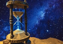 Majestic Wooden Hourglass Against Cosmic Starfield And Sand Dunes