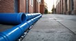  Blue pipe, urban setting, construction or utility work