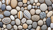 Display stones with unique patterns and textures along a sandy beach.