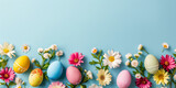 Fototapeta Niebo - Colorful Easter eggs and spring flowers on a pastel background.