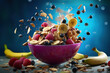 Bowl of cereal with fruits and nuts exploding in motion. Healthy food and lifestyle.