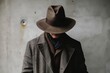 © Eranda - man cover his face by cowboy hat on concrete background
