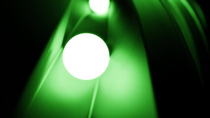 Poster - Small light balls rolling among narrow metal track. Design. Shining white spheres on path.