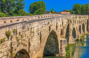 Old bridge above Orb s river in Beziers, France