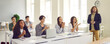 © Studio Romantic - Joyful excited college students applaud after successful lecture by teacher. Students sit at their desks and together with the teacher clap their hands, looking in front of them. Horizontal banner.