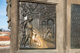 Fototapeta Na drzwi -   relief at John of Nepomuk Statue at Charles Bridge in Prague, Czech Republic