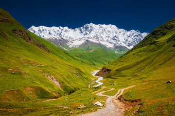 Wall Mural - An incredible view of the valley of the Enguri river and Main Caucasus Range. Upper Svaneti, Georgia.