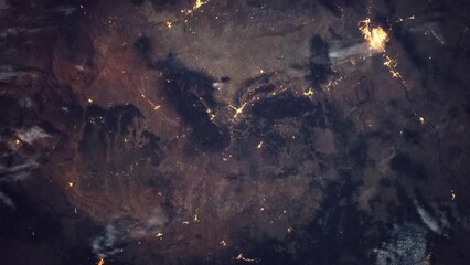 Wall Mural - earth surface seen from space: land and clouds. view from international space station. public domain