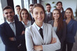© song - Confident Business Professionals Smiling Directly at Camera in Workplace Environment