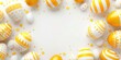 White and yellow festive easter eggs frame background with free copy space inside, 