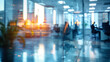 © JMarques - Blurred office with people working behind glass. Teamwork, healthy, ecological and business environment.