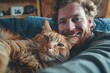 Smiling Man Taking a Selfie with a Rescued Ginger Cat Indoors