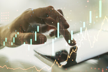 Poster - Abstract creative financial graph with finger clicks on a digital tablet on background, forex and investment concept. Multiexposure
