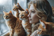 beautiful woman sitting with her cats at home