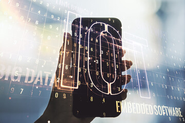 Poster - Double exposure of creative IOT hologram and hand with cell phone on background, research and development concept