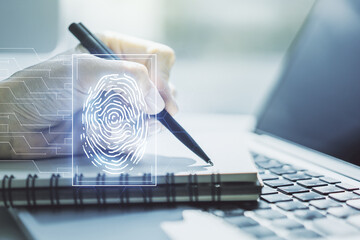 Aufkleber - Abstract creative fingerprint illustration with hand writing in diary on background with laptop, personal biometric data concept. Multiexposure