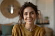 © Prasanth - Profile picture of happy millennial caucasian woman posing in own new home apartment. Close up headshot portrait of smiling female renter or tenant satisfied with real estate agency services.