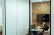 © BGStock72 - Casual Business Meeting in a Modern Office Lounge
