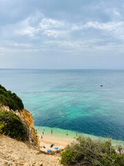 Wall Mural - Amazing sand beach at the rocky ocean coast