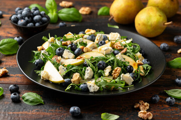 Wall Mural - Pear Gorgonzola cheese, blueberries and Walnut Salad. Healthy food