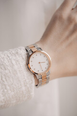 Wall Mural - Beautiful elegant watch on woman hand. Close-up photo.