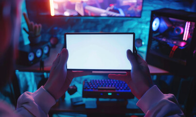 Two hands holding a mobile device with horizontal white screen, gamer room background