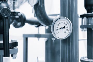 Poster - Pipes and taps in water supply boiler room, engineering industrial background