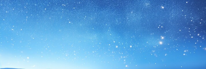 Poster - A mesmerizing view of a vast blue sky adorned with countless twinkling stars, creating a breathtaking celestial spectacle
