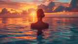 Fototapeta  - Paradise luxury resort honeymoon getaway destination at idyllic Caribbean tropical hotel, woman silhouette swimming in infinity pool watching sunset 