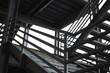 Metal overpass platform with banister structure of the factory place. Industrial building part. Close-up and selective focus.