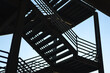Metal overpass platform with banister structure of the factory place. Industrial building part. Close-up and selective focus.
