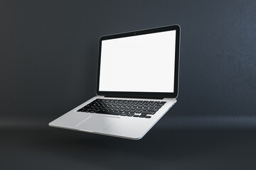 Poster - Open laptop with a blank screen on a dark textured background, professional workspace concept. 3D Rendering