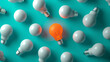 © HelenP - An orange lightbulb glowing among a group of white lightbulbs on a teal background, representing a unique idea or solution.
