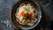 Udon Japanese cuisine noodle topping with ikura salmon roe.