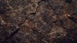 © Matthew - A dark brown, rough mountain surface provides the texture for the background, resembling dark rock.