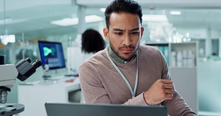Scientist, man thinking and research on computer for laboratory test, exam or medical results of DNA. Asian science expert or people on laptop and biotechnology for cancer solution or problem solving