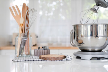 Young woman embraces joyful moments in kitchen.