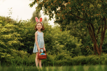 Sticker - child with painting eggs outdoors