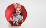 Fototapeta Tulipany - Girl with painted eggs