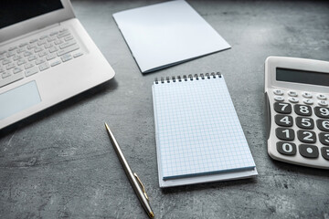 Poster - Office desk laptop computer with empty blank notebook pen, workplace at remote work