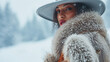 Elegant Woman in Winter Fashion with Fur Coat and Wide-Brimmed Hat Against Snowy Landscape Background