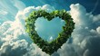 Heart made from leaf green foliage floating in cloudy blue sky