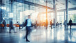 © DigitalProvoke - Bright business workplace with people in walking in blurred motion in modern office space