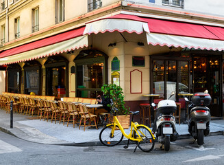 Wall Mural - cozy street with tables of cafe in paris, france. cityscape of paris. architecture and landmarks of 