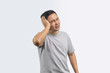 Portrait of man grabbing his head showing stress gesture and headache isolated on white background