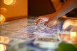 © Leka - woman using interactive touchscreen display of electronic kiosk